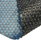 Pellicola Galleggiante Solare PE Piscina 732x366 cm Nero e Blu