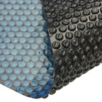 Pellicola Galleggiante Solare PE Piscina 600x400 cm Nero e Blu