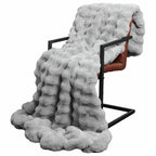 Coperta antiscivolo in sintetica di coniglio Olite Grigio